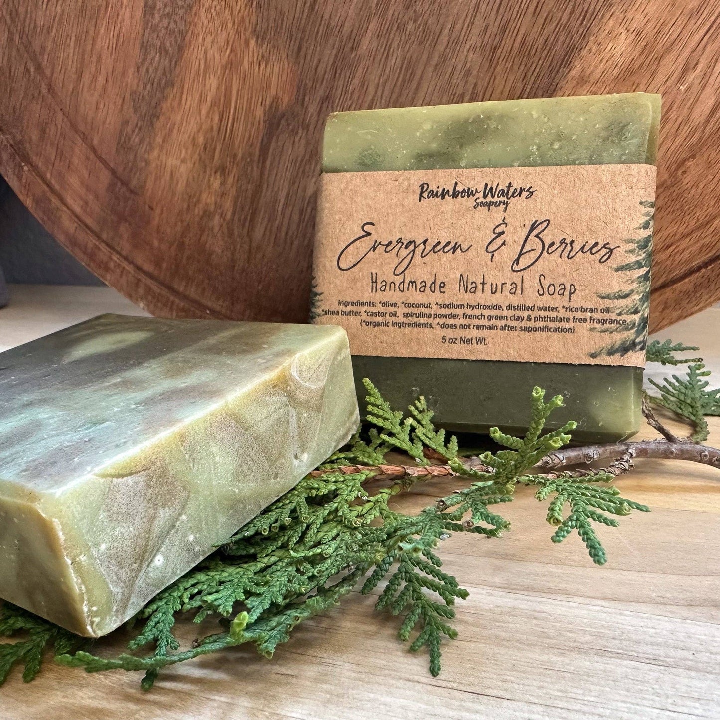 evergreen and berries natural soap bars with evergreen tree needles