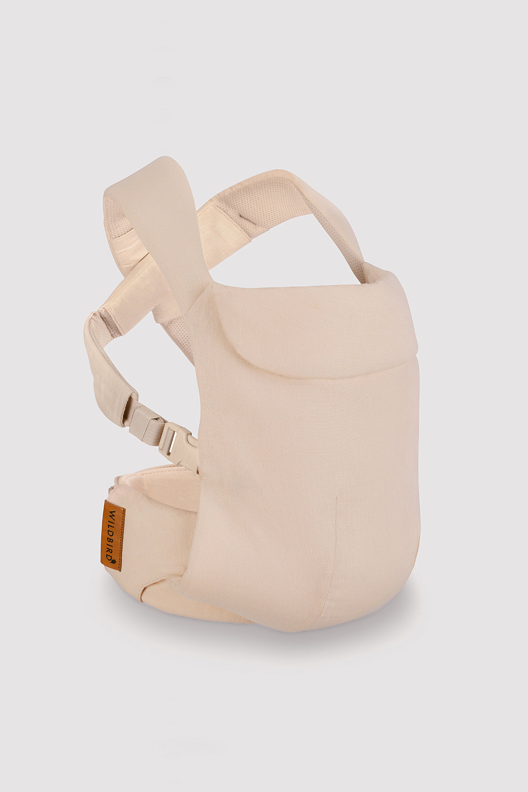 Beige baby carrier on a light gray background