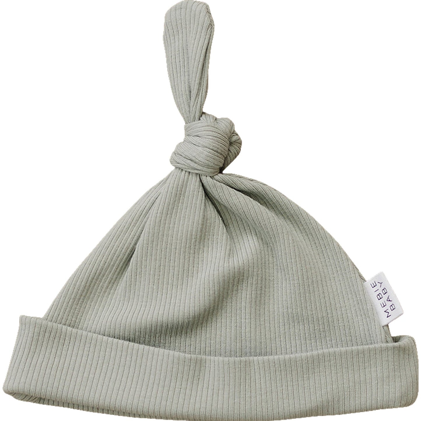 Light green ribbed baby hat with a knot on top and a label on a white background