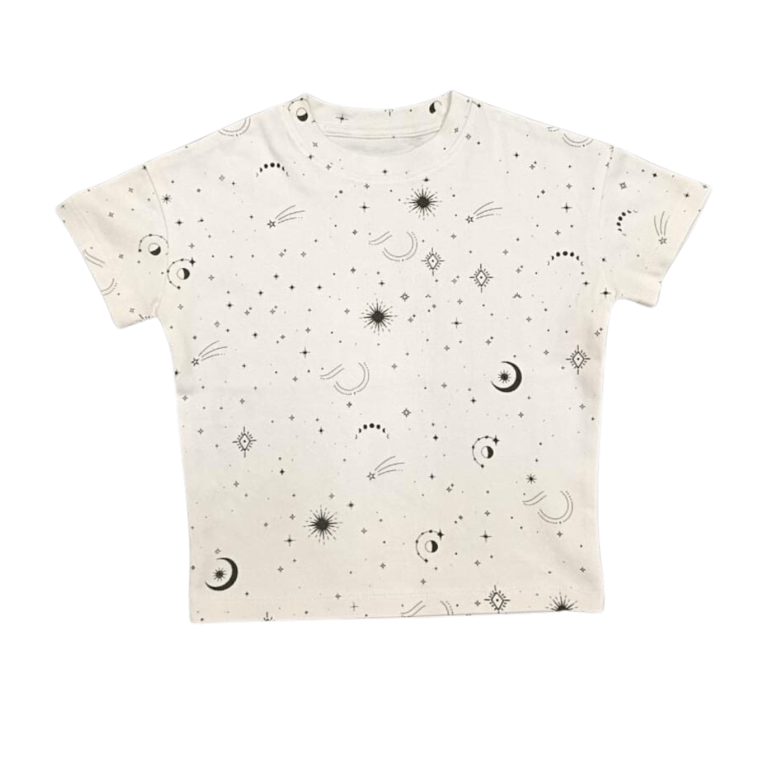 White t-shirt with celestial pattern on a white background