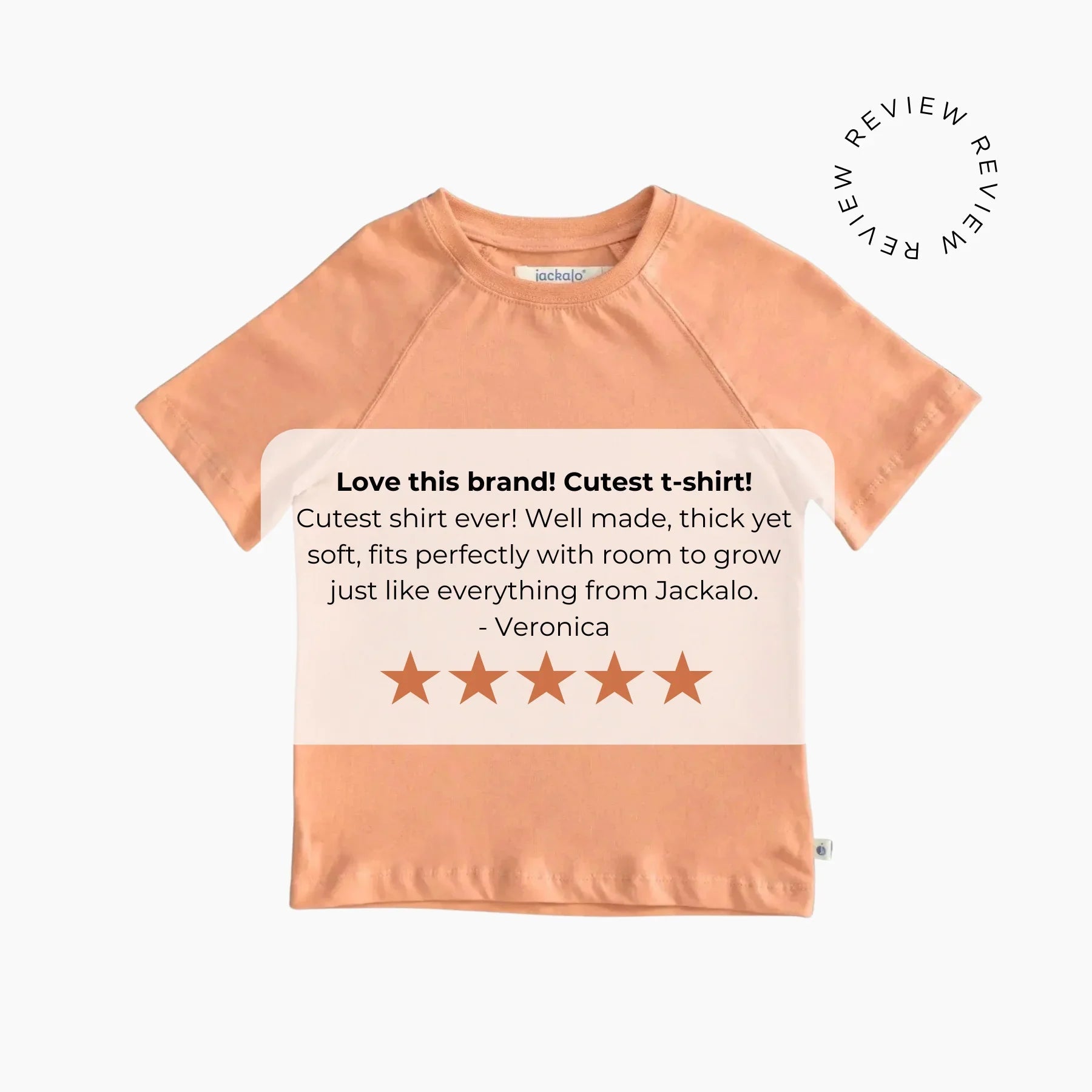 Peach-colored t-shirt with customer review text on a white background