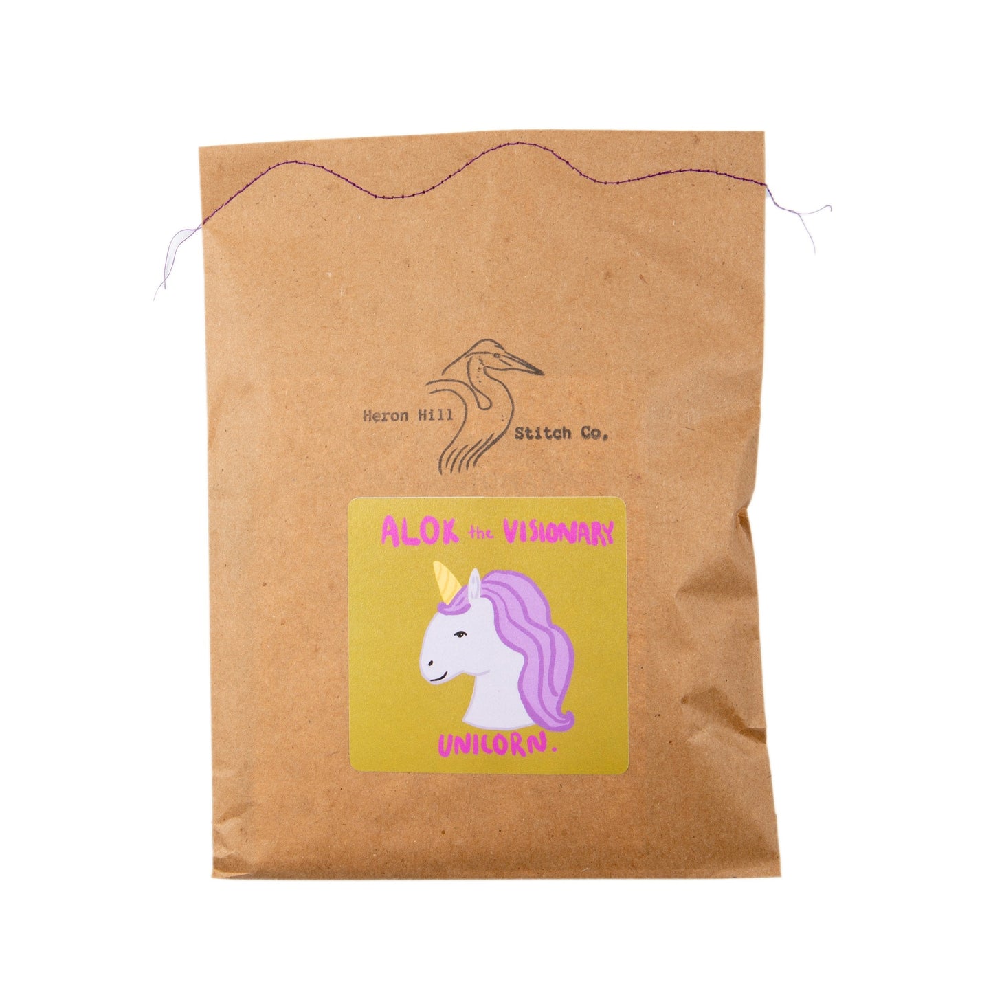 Brown drawstring bag with a unicorn label and logo on a white background