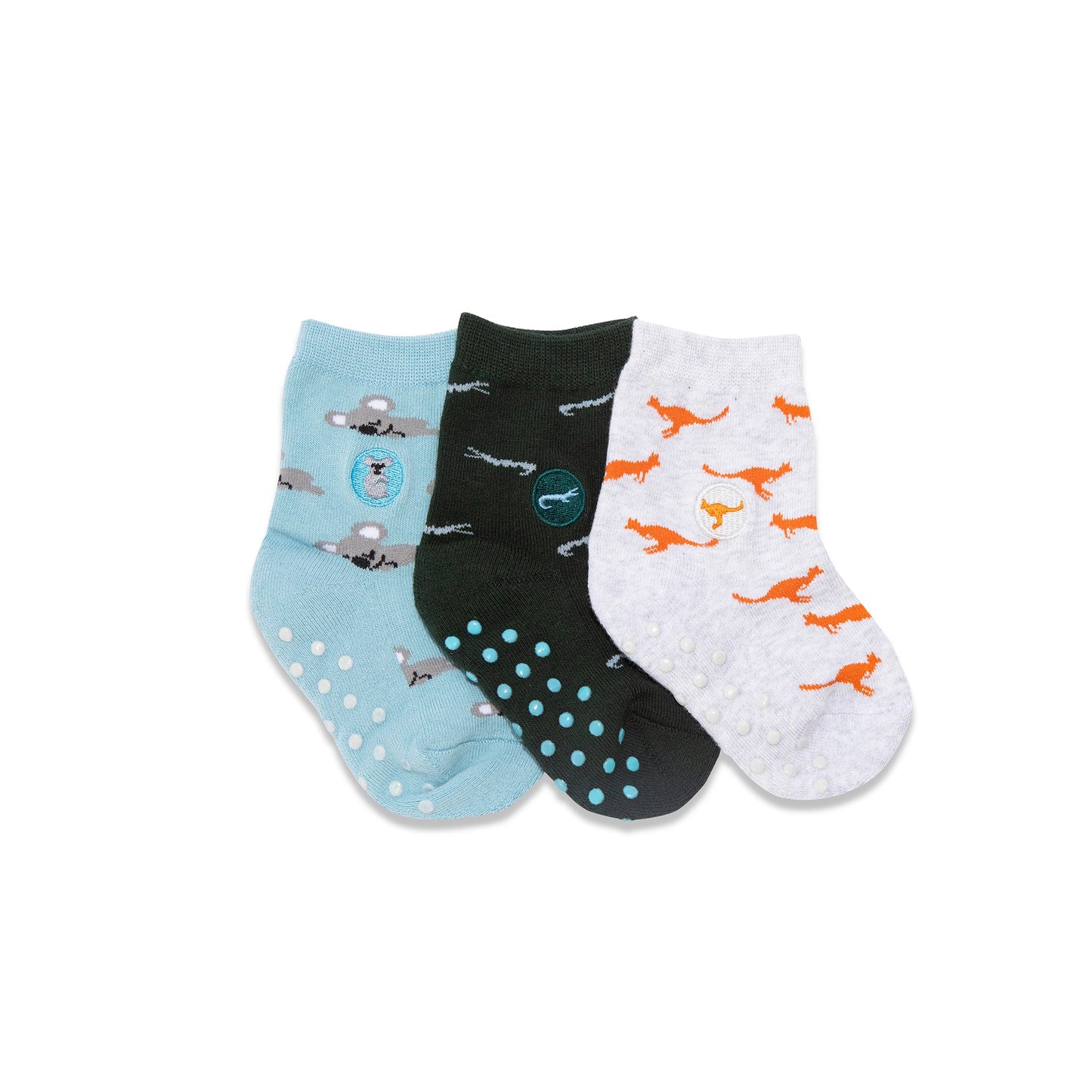 Three pairs of socks with different patterns on a white background