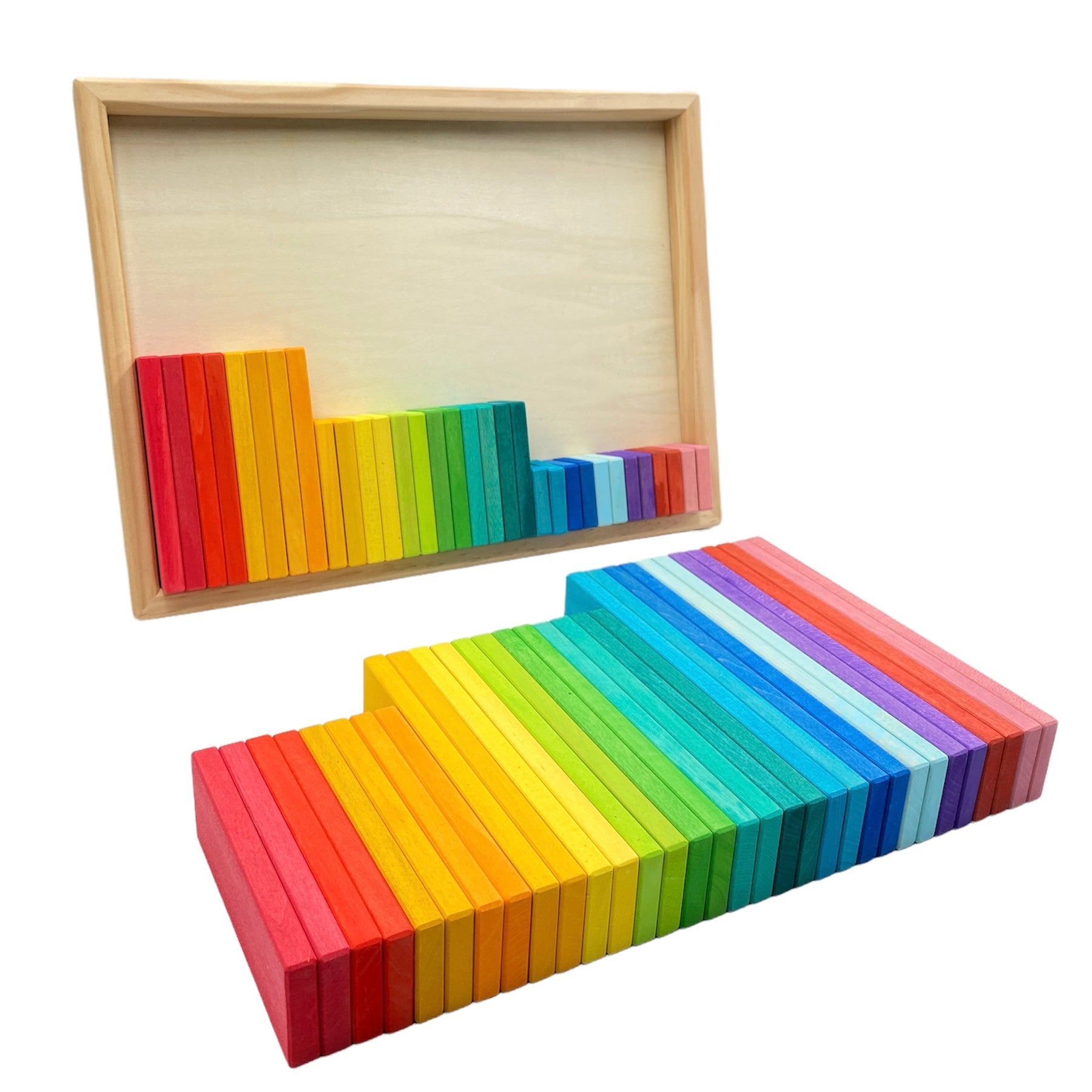 Set of rainbow-colored wooden blocks with a wooden box on a white background