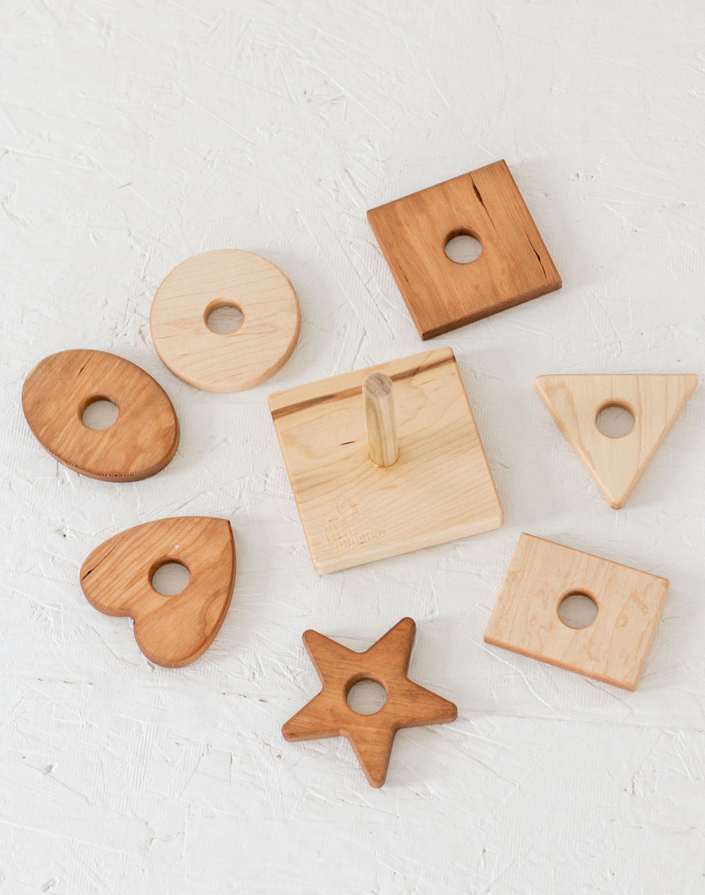 Wooden geometric shapes on a light background