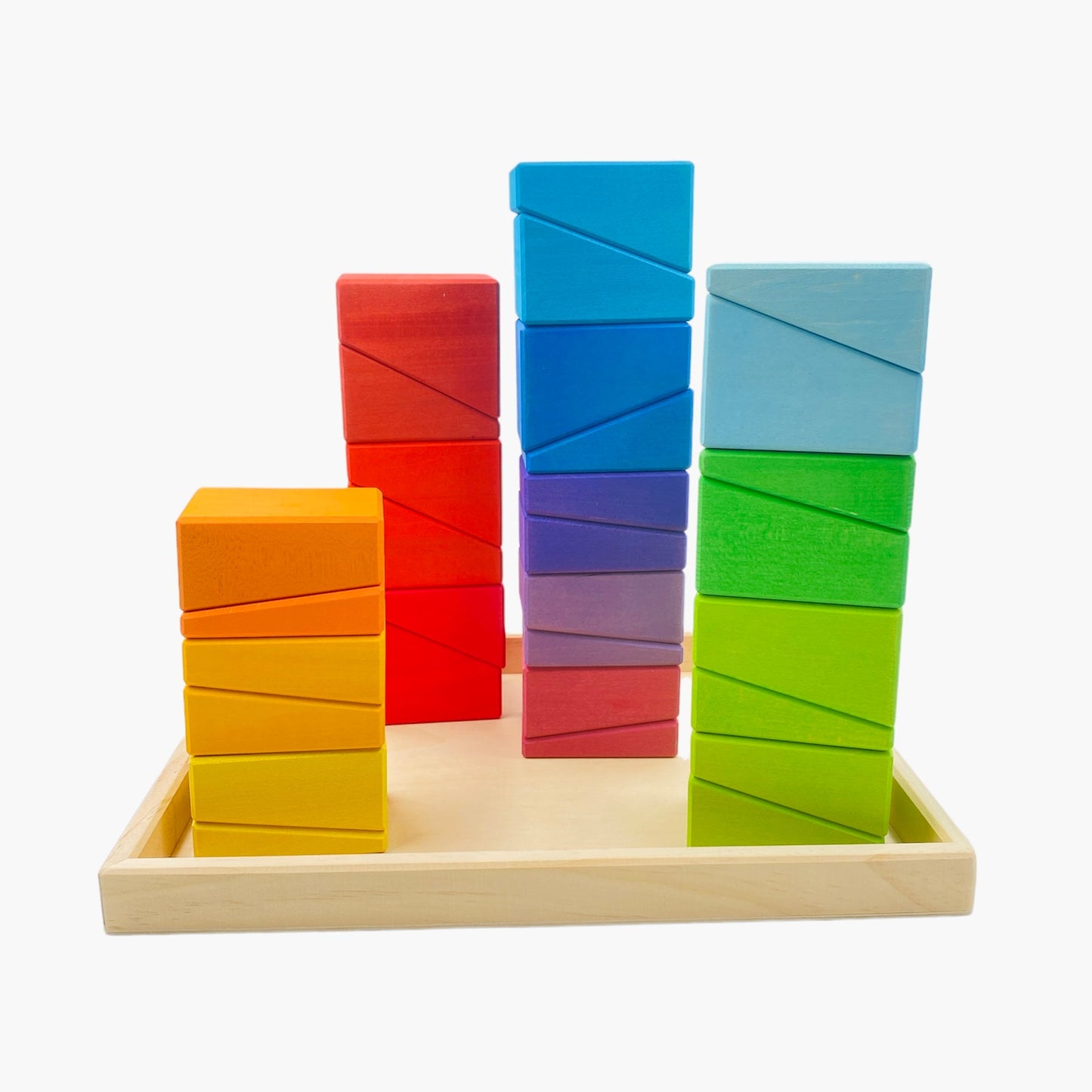 Colorful wooden blocks stacked on a white background