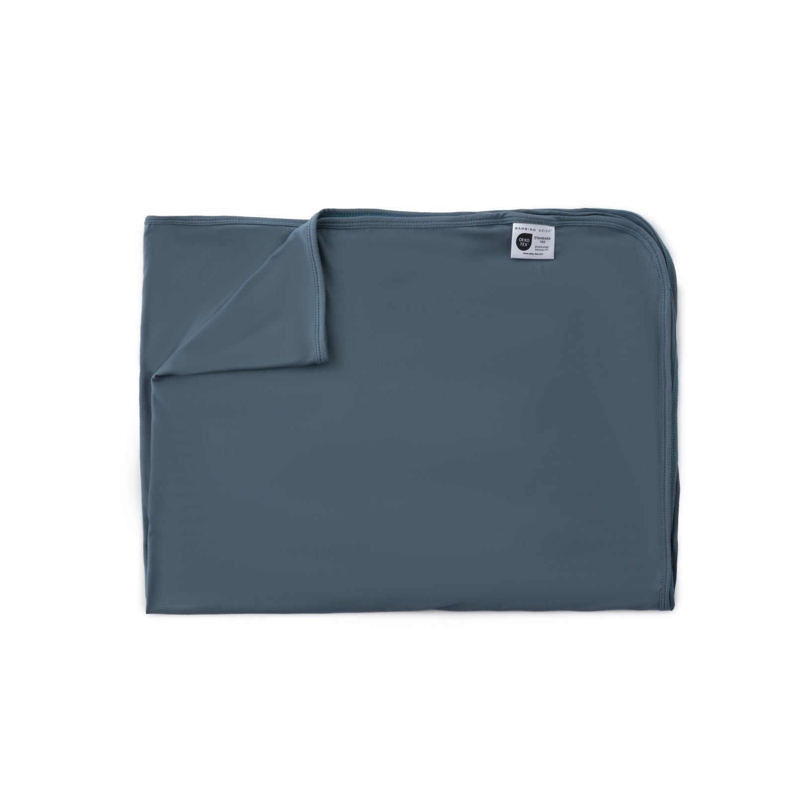 Folded blue blanket with a label on a white background