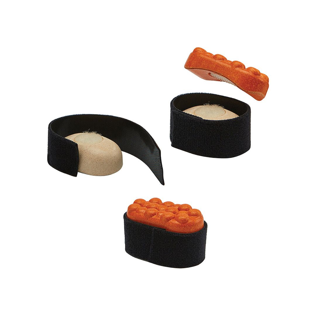 Set of catnip toys shaped like sushi on a white background