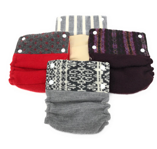 Set of patterned leg warmers on a white background