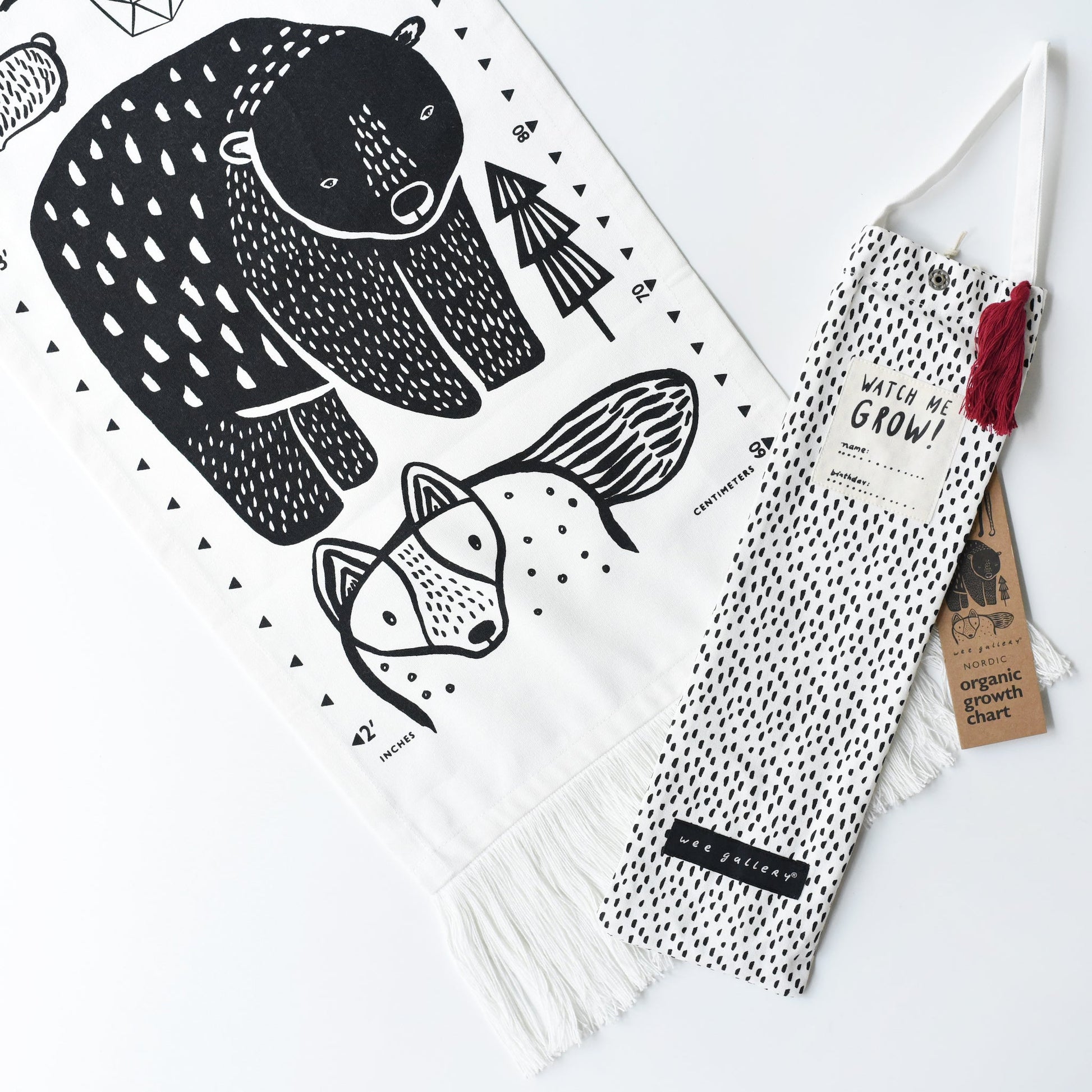 Scarf with fox design and organic cotton label on a white background