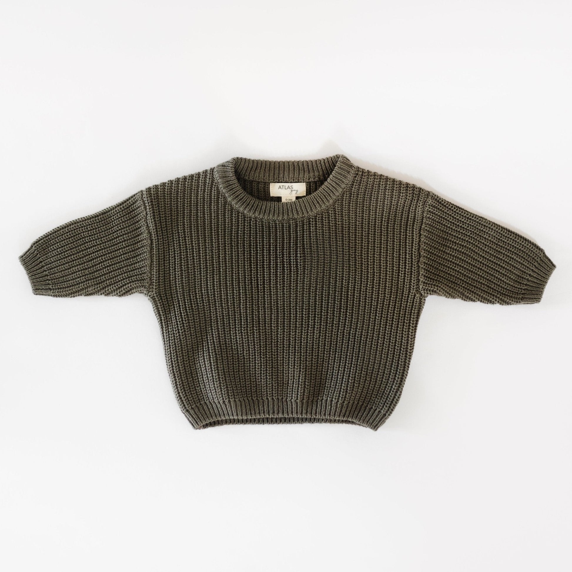 Knitted sweater on a white background
