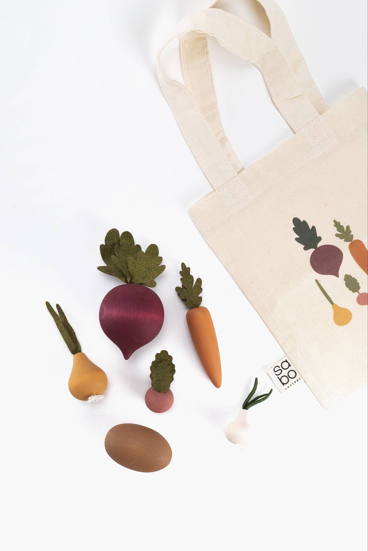 a set of 6 wooden vegetables with a cotton totebadg