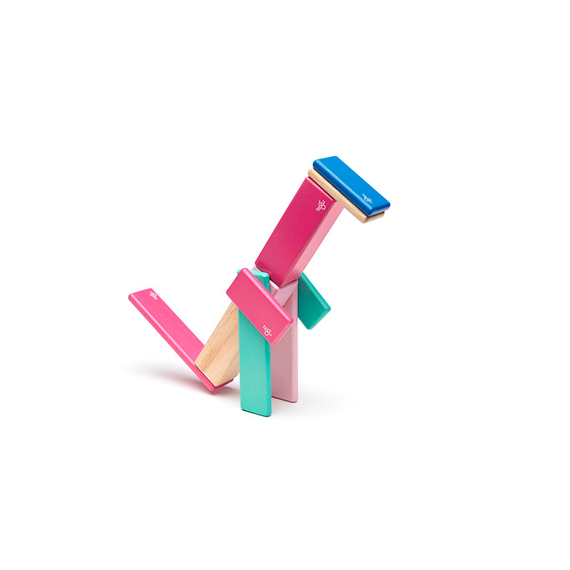 Colorful geometric wooden blocks stacked on a white background