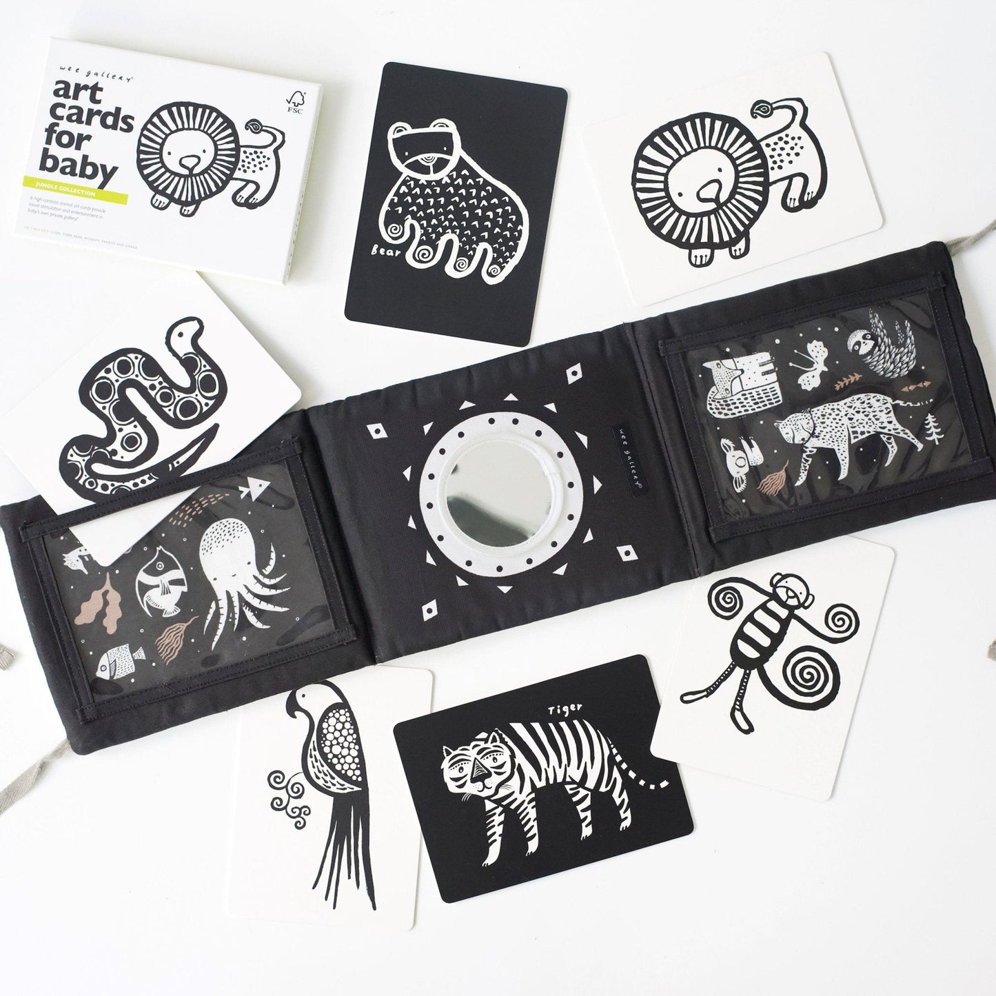 Black and white art cards with animal illustrations on a white background