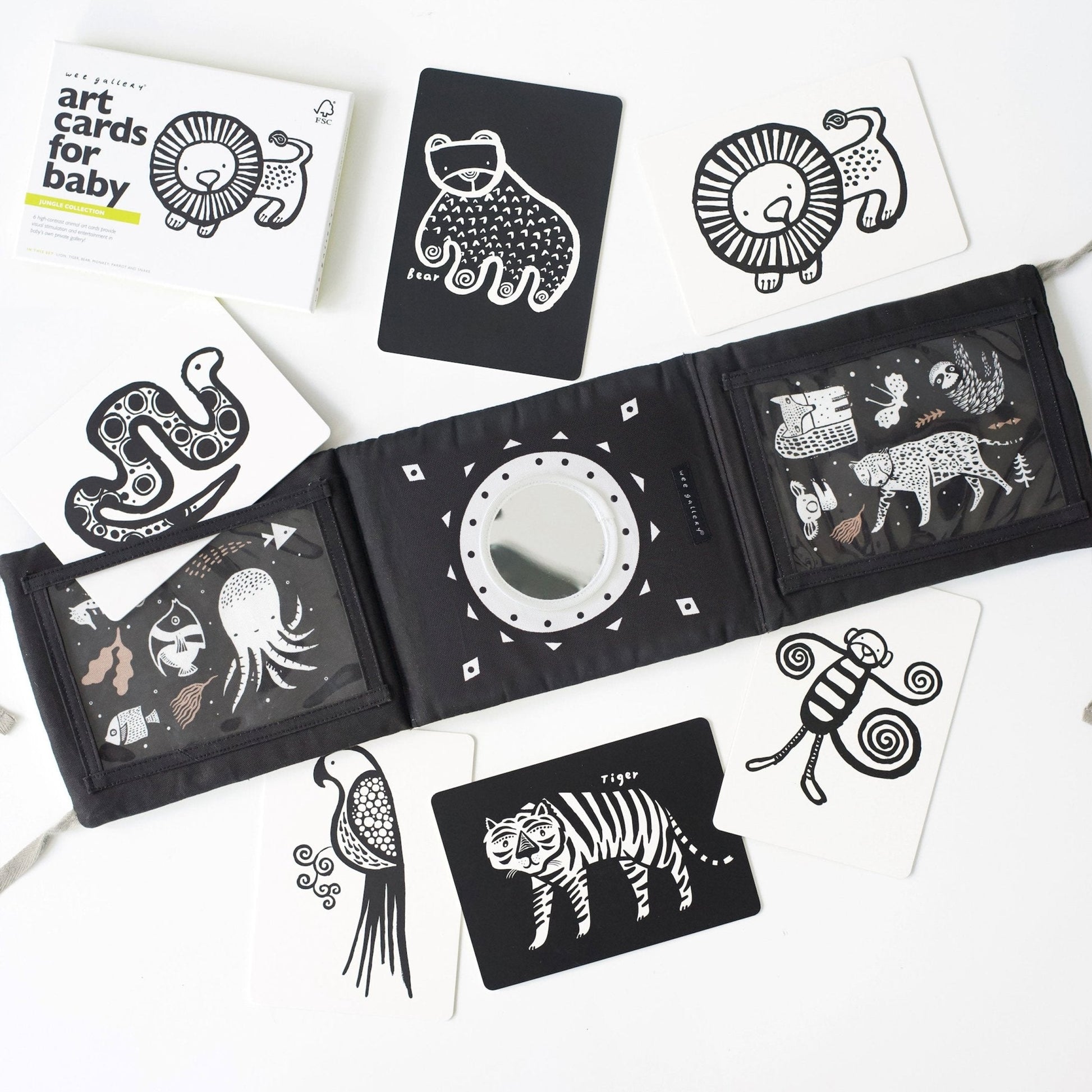 Black and white art cards with animal illustrations on a white background
