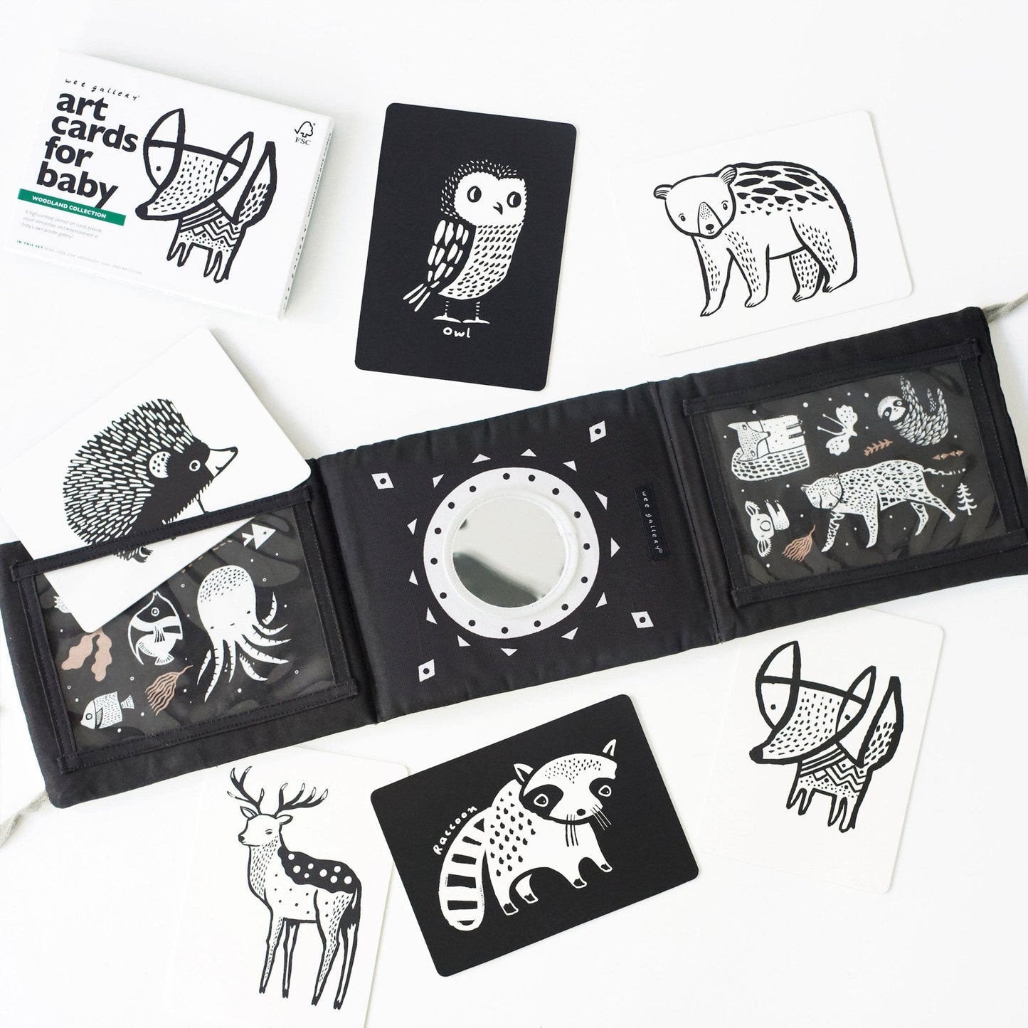 Black and white art cards with animal illustrations on a white background