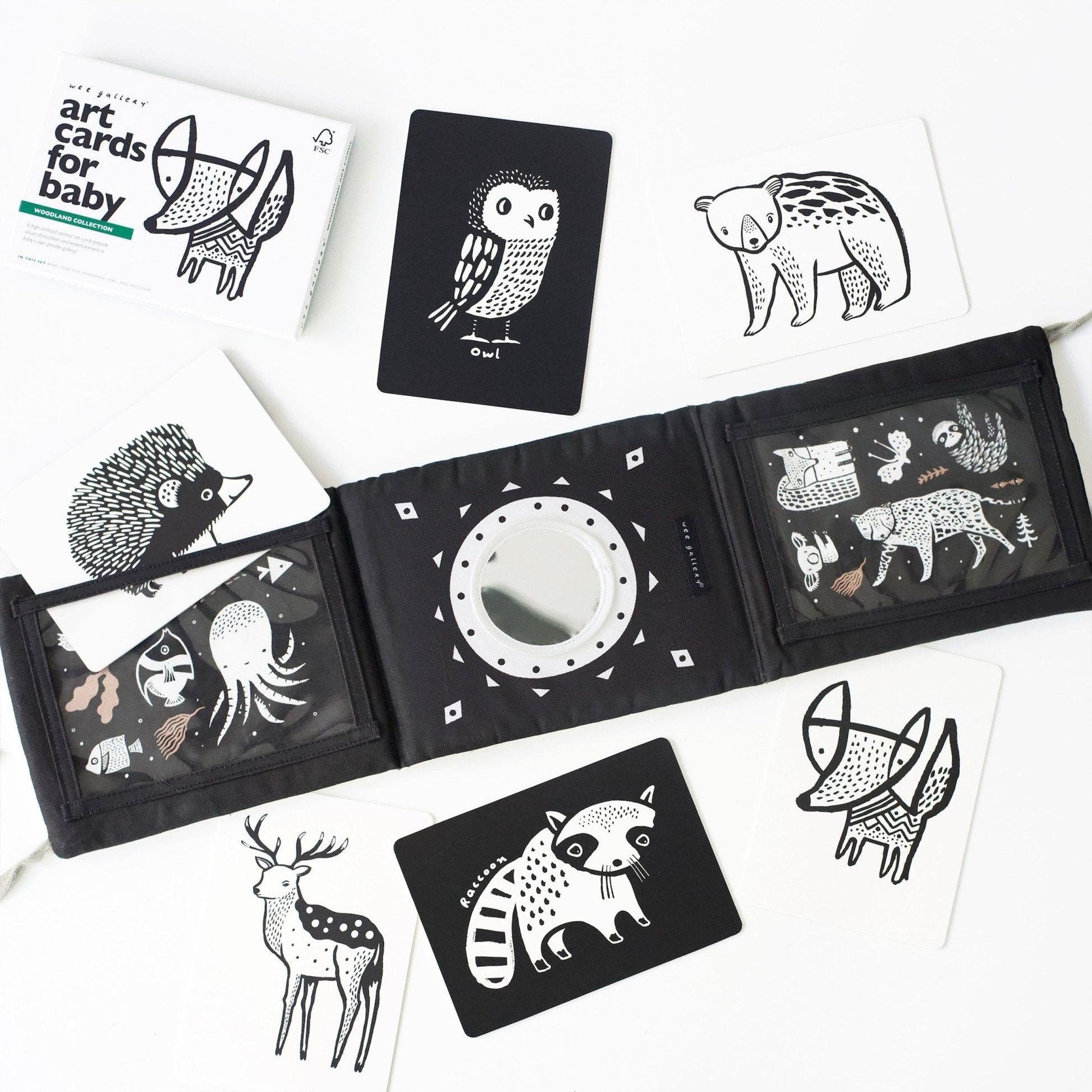 Black and white art cards with animal illustrations on a white background